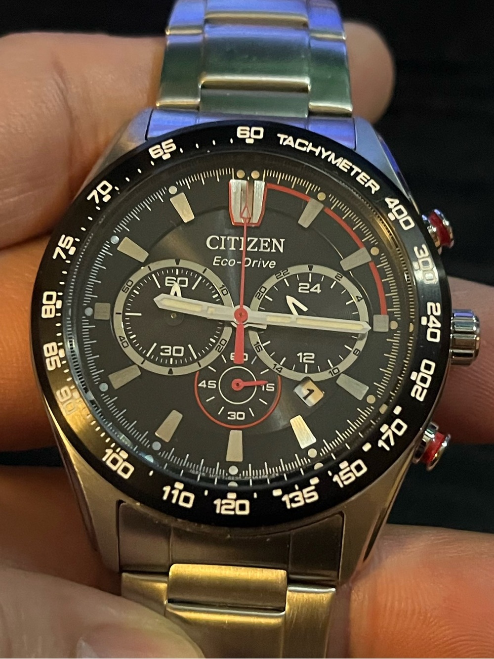 Citizen Eco-Drive black & red watch with
tachymeter complication. Model b620-R01
